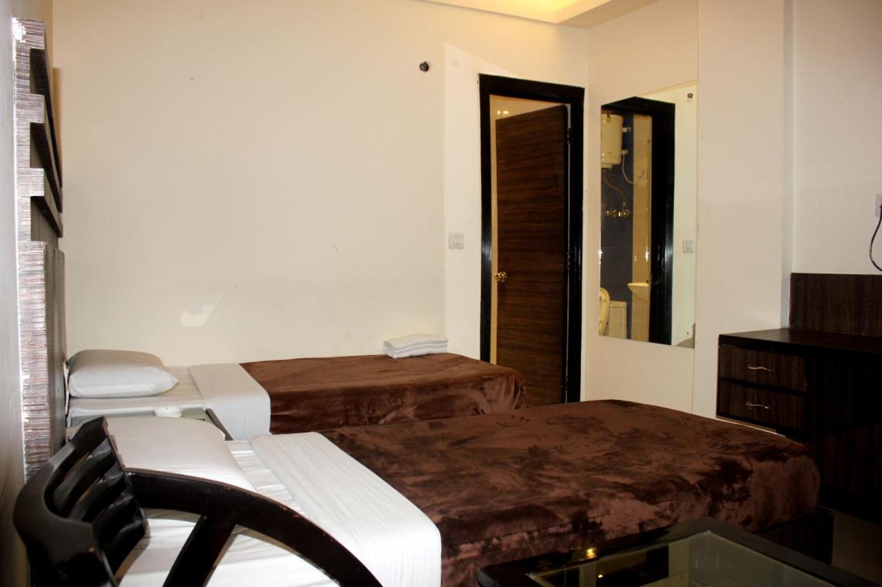 Aman Deluxe Hotell New Delhi Exteriör bild